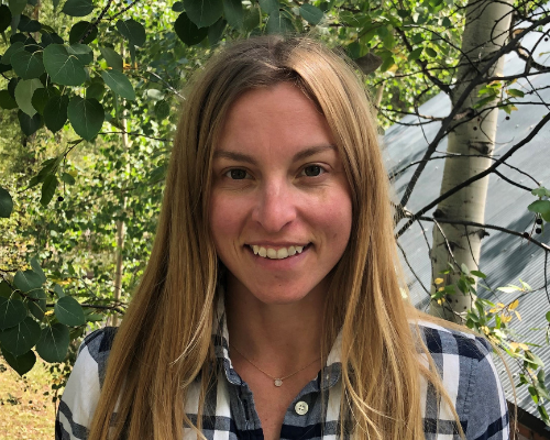 Emmy Garrigus has long blonde hair and light skin