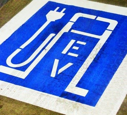 Electric vehicle charging car space